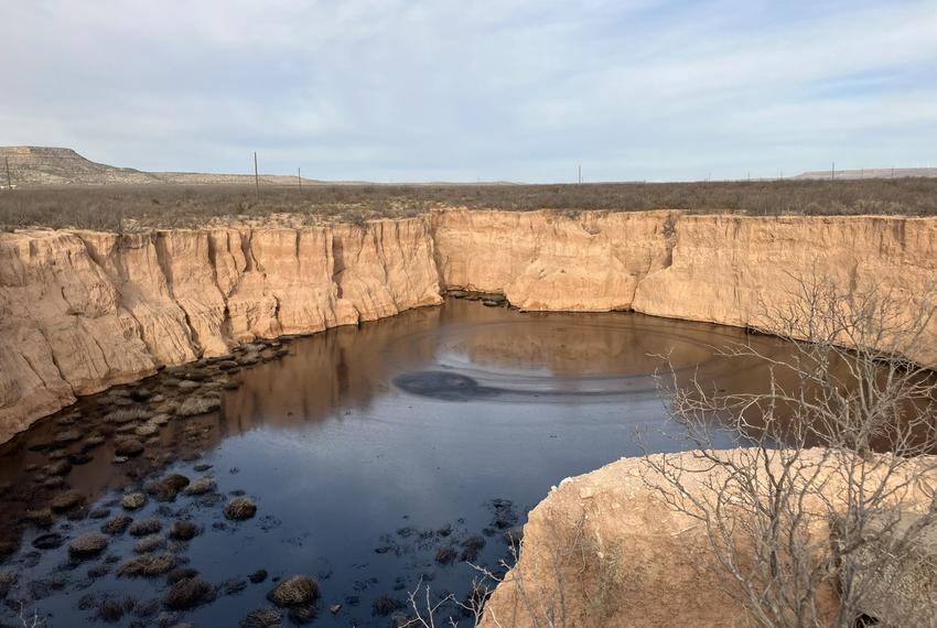 A sinkhole formed by an old oil well on the Kelton Ranch in Upton County, Texas, has grown rapidly in the past year.